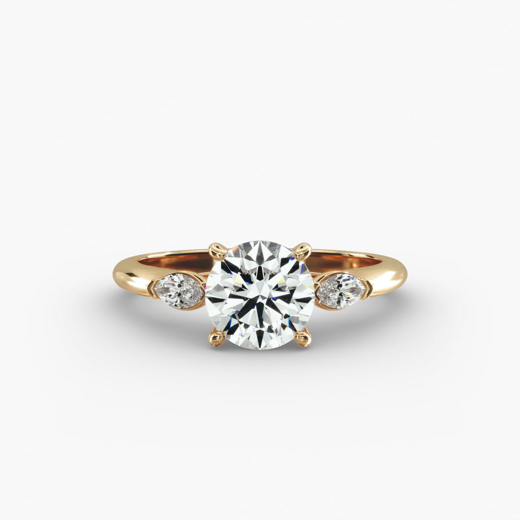 Marquise Cut Diamond Three Stone Engagement Ring In 18K